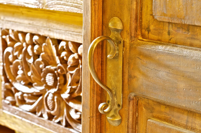 Balinese hardware, carvings and door. See an entire house built from Balinese goods.