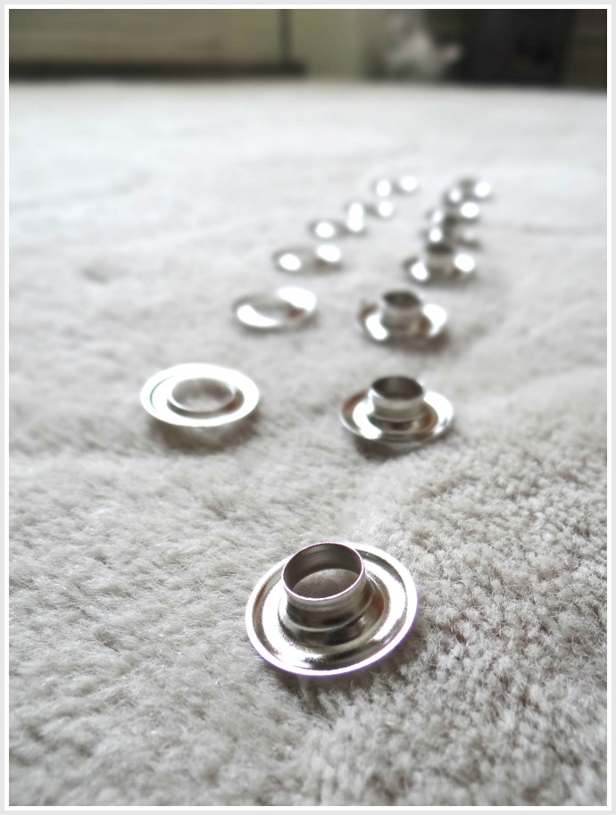 Well behaved grommets all in a row. Getting ready for the how to tutorial on making a shower curtain with an Ikea throw blanket. An awesome #DIY 