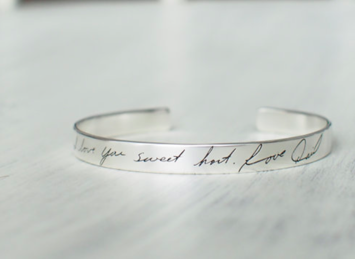 Hand writing on jewelry on Etsy 